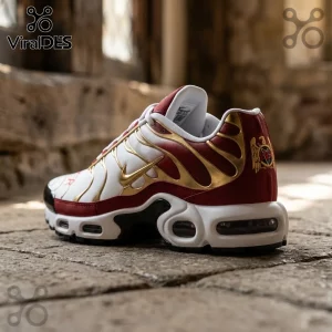 Nike Air Max Plus sneaker in white, deep red, and gold featuring a metallic gold swoosh and eagle emblem on the heel.!