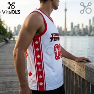 White basketball jersey with red trim, featuring Toronto Tempo text, maple leaf patterns, and Toronto skyline graphic.!