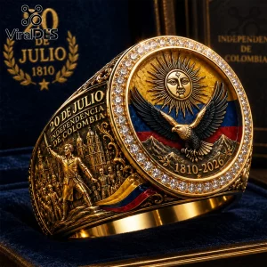 Gold Colombian independence ring featuring a sun emblem, eagle, national flag colors, and 1810-2026 engraving in a case.!