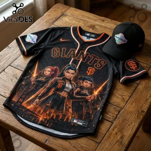 San Francisco Giants baseball jersey and matching black cap featuring anime character graphics on a wooden table.!