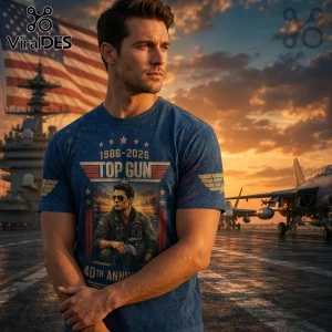 Man wearing navy blue Top Gun 40th anniversary t-shirt featuring fighter pilot graphic and 1986-2026 text on flight deck.!