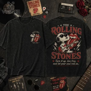 Black vintage-wash t-shirt with Snoopy playing electric guitar and Rolling Stones logo on front and back.!