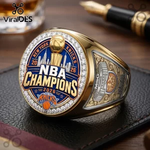 New York Knicks 2026 NBA championship ring with gold finish, blue enamel, embedded crystals, and Madison Square Garden logo.!