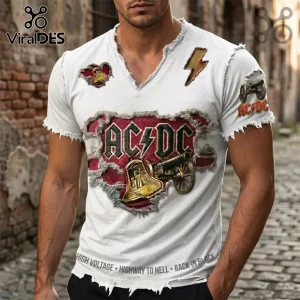 White V-neck t-shirt featuring AC/DC graphic with distressed fabric effects, gold bell, cannon, and lightning bolt motifs.!