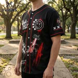 Black Blink-182 baseball jersey with red piping, UFO graphic, smiley logo, and city silhouette print on polyester fabric.!