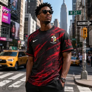 Man wearing black and red Kappa Alpha Psi Greek apparel with white Nike swoosh on a New York City street.!