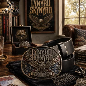 Lynyrd Skynyrd metal belt buckle featuring an eagle emblem, Free Bird text, and red, white, and blue accents on leather belt.!