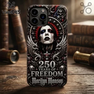 Marilyn Manson phone case featuring gothic skull artwork, patriotic red, white, and blue accents, and text reading Freedom.!
