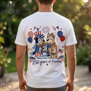 White t-shirt featuring Bluey characters in patriotic outfits with balloons, fireworks, and text 250 years of freedom.!