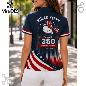 Navy blue polo shirt with Hello Kitty in a patriotic top hat holding a US flag and text 250 Years of Freedom 1776-2026.!