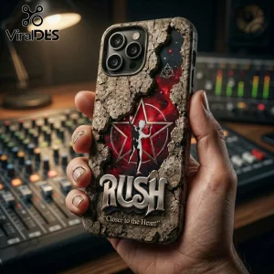 iPhone case featuring the Rush 2112 Starman logo, stone texture relief, and galaxy background on a recording studio desk.!