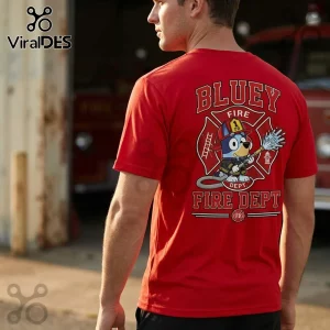 Man wearing red cotton t-shirt with Bluey firefighter graphic on back featuring cartoon character, helmet, and hose.!