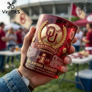 Red glass Oklahoma Sooners 2026 NCAA National Champions tumbler featuring a gold baseball logo and text embossing.!