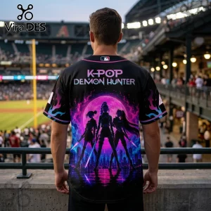 Black baseball jersey with K-POP DEMON HUNTER text, featuring a purple neon anime graphic of three warriors at a stadium.!