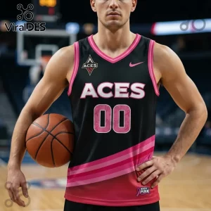 Las Vegas Aces basketball jersey in black with pink accents, number 00, and Rock Pink ribbon detail on a male athlete.!