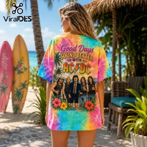 Tie-dye t-shirt featuring AC/DC band members, palm trees, hibiscus flowers, and the text Good Days Sound Better With AC/DC.!