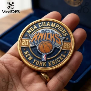 Gold and blue New York Knicks NBA Champions 2026 commemorative coin held in a hand with a blue velvet display box.!