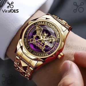 Ozzy Osbourne gold-tone watch with purple crystal dial, gold bat emblem, and text reading Prince of Darkness.!
