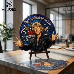 Round stained glass suncatcher featuring Jon Bon Jovi, text The Soundtrack Of My Life, and a winged heart on a wood stand.!
