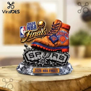 Collectible 2026 NBA Finals desk ornament featuring a tan boot with Knicks branding resting on a stone San Antonio Spurs base.!