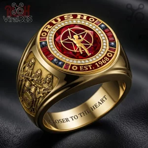 Gold Rush band ring featuring a red Starman center stone, diamond bezel, band member relief, and Closer to the Heart text.!