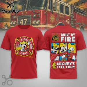 Red graphic t-shirt featuring Disney characters as firefighters, including Mickey Mouse, Goofy, and Donald Duck prints.!