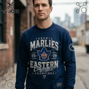 Man wearing a navy blue Toronto Marlies Eastern Conference Champions sweatshirt with a distressed maple leaf and crown logo.!