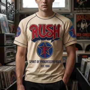 Cream colored cotton T-shirt featuring red and blue embroidered Rush logo, Starman emblem, and vintage rock band text.!