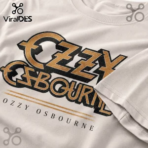Cream colored cotton t-shirt featuring a distressed gold and black Ozzy Osbourne logo and text graphic on the chest.!