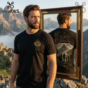 Black cotton t-shirt with gold One Ring chest logo and The Lord of the Rings back graphic featuring the fellowship.!