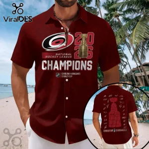 Maroon button-up shirt featuring Carolina Hurricanes 2026 Stanley Cup Champions graphics and team player signatures.!