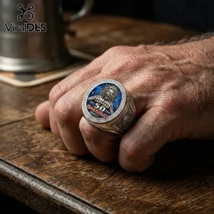 Silver-toned Iron Maiden 50th anniversary ring with an Eddie mascot inlay on a blue lightning background.!