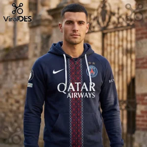 Man wearing a navy blue Paris Saint-Germain zip-up hoodie featuring the Qatar Airways logo and two stars on chest.!