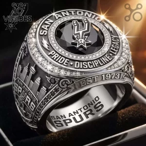 San Antonio Spurs championship-style ring with black stone, silver metal, skyline detail, and engraved text Pride Discipline.!