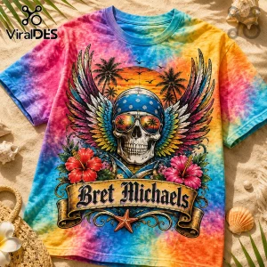 Tie-dye t-shirt featuring a skull with wings, bandana, sunglasses, and hibiscus flowers over a Bret Michaels banner.!