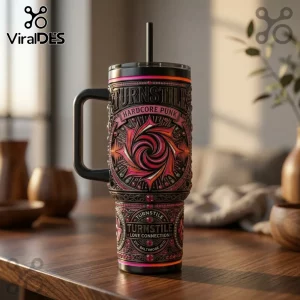 Turnstile Hardcore Punk insulated tumbler with a black handle, pink spiral graphic, and Love Connection text on wood table.!