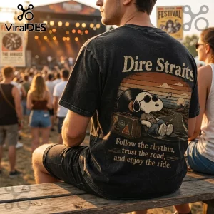 Black acid-wash t-shirt with Dire Straits and Snoopy graphic, wearing sunglasses on a vinyl record, at an outdoor concert.!