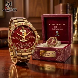 Gold Kappa Alpha Psi fraternity watch with red dial, diamond-studded bezel, and matching red presentation box.!