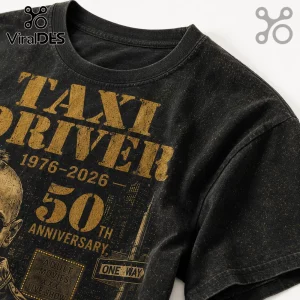 Vintage black t-shirt featuring distressed gold Taxi Driver 50th anniversary graphic with 1976-2026 text and city skyline.!