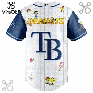 Tampa Bay Rays baseball jersey featuring Peanuts comic strip print, large TB logo, and Snoopy characters on white fabric.!