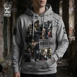 Grey pullover hoodie featuring a Resident Evil 30th anniversary collage graphic with characters Leon and Jill Valentine.!