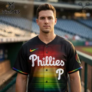 Man wearing black Philadelphia Phillies baseball jersey with rainbow gradient front panel and Nike swoosh logo.!