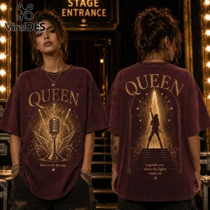 Maroon vintage wash t-shirt featuring gold Queen band graphics, microphone, stage silhouette, and inspirational text.!