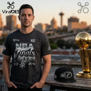 Man wearing gray 2025-2026 San Antonio Spurs Western Conference Finals t-shirt with matching black cap and gold trophy.!