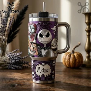 Stainless steel tumbler featuring Nightmare Before Christmas characters, purple background, and name Michael on a plaque.!