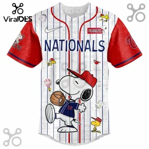 Washington Nationals baseball jersey featuring Snoopy and Woodstock graphics, red sleeves, and blue pinstripes on white.!