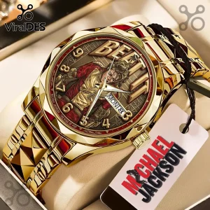 Gold Michael Jackson Beat It themed wristwatch with a textured red and gold dial, day-date window, and metal link band.!