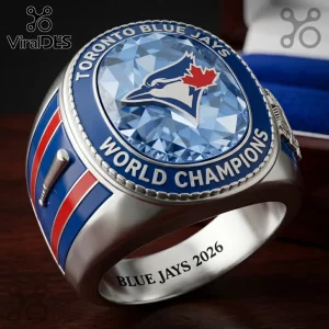 Toronto Blue Jays championship ring with silver band, blue enamel, red maple leaf logo, and inscribed Blue Jays 2026 text.!