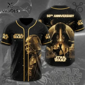 Black baseball jersey with gold Darth Vader graphics, 50th Anniversary text, and Star Wars logos on a starry background.!