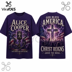 Purple graphic t-shirt featuring Alice Cooper, a microphone with snakes, US flag, and religious cross motifs.!